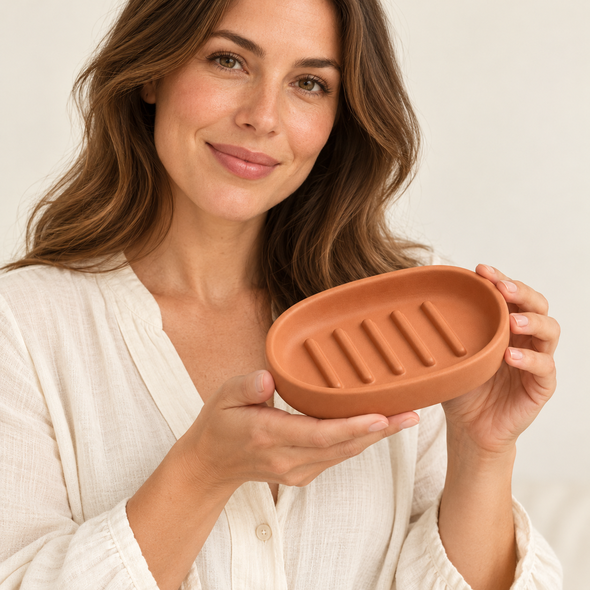 Oval Soap Dish — woman holding dish